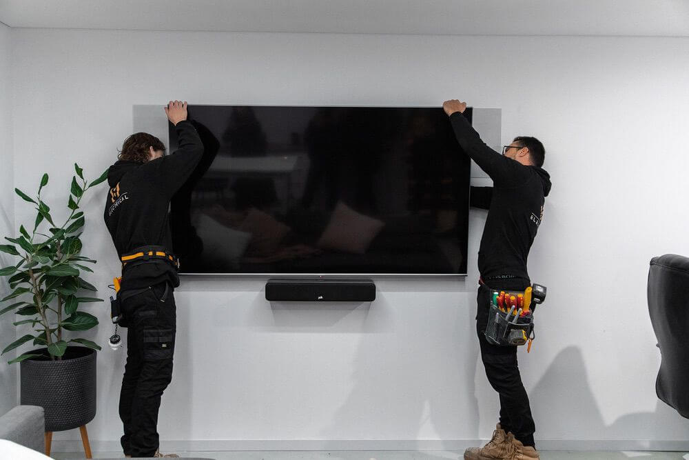 181 Electrical team installing a TV